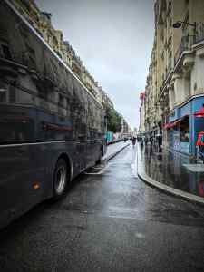 Coach getting a little too close for comfort, riding on the kerb protection on Rue Beaubourg