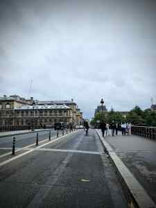 Wand-protected cycle lane on Pont Notre-Dame, crossing the Seine