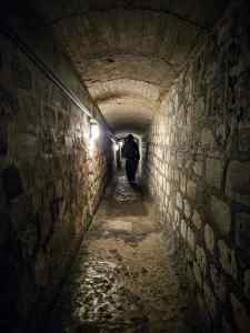 In a tunnel in the Paris Catacombs