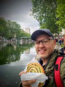 Eating pastries on the banks of Canal Saint-Martin
