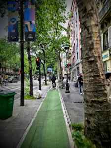 Narrow painted cycle path on Boulevard de Magenta