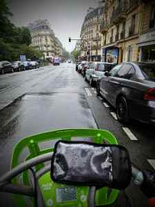 Riding in the rain on Rue Monge