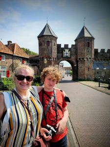 Posing in front of Koppelpoort gate