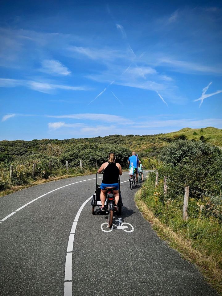 Riding up one of the hills to the beach