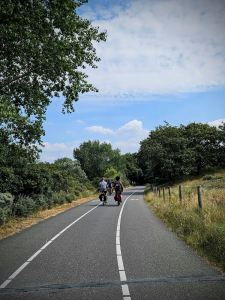 Riding along the path, back from the beach