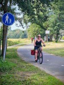 Riding past at the bottom of the hill