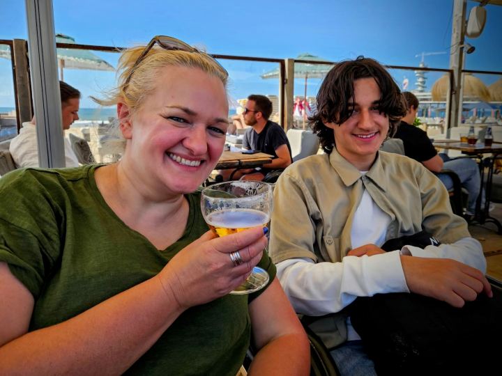Enjoying a drink in a bar on the beach