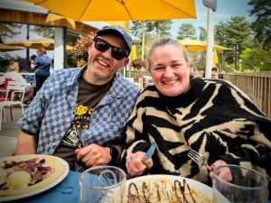Enjoying pancakes on our last day, outside at the Pancake House