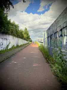 Leaving the underpass under the railway, next to N14 Noordelijke Randweg