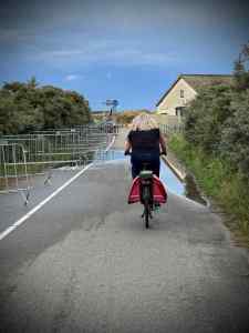 Arriving at the beach, temporary cycle parking on the left
