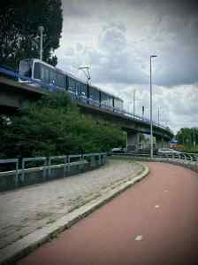 Tram passing over the cycle path and N471