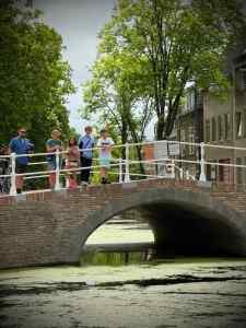 Posing on the bridge on Gasthuissteeg