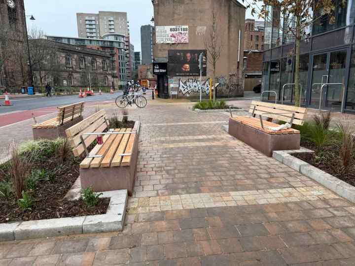 New paved area with seating and planting