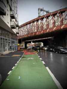 Painted lane changing to kerb-protected path