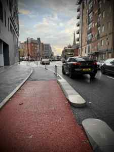 End of Kerb-protected cycle path