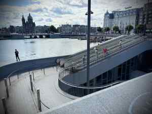 Escalators down to Stationsplein underwater cycle parking