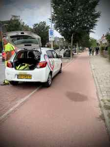 Construction car parked on the median on Waalsdorperweg