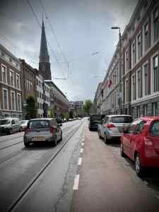 Blocked door-zone cycle lane next to the tram tracks on Parkstraat