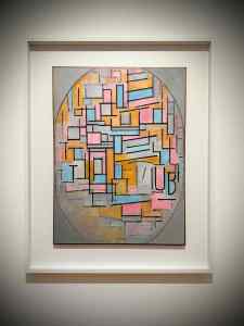 Composition in Oval with Coloured Surfaces 2 by Piet Mondrian