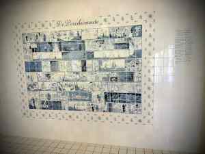 Tiled picture telling the story of the influence of Chinese porcelain on Delftware