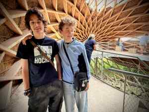 The boys posing inside