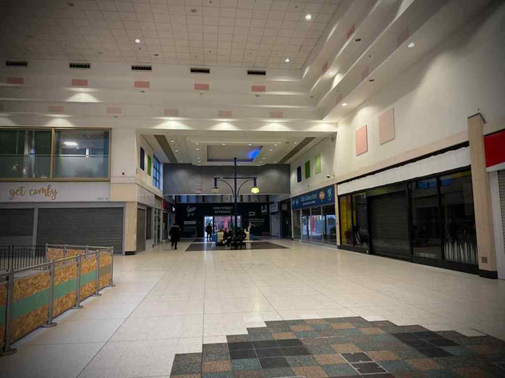 Shops closed, looking towards Sir Tony Lloyd Square