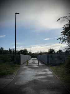 Bridge across the railway tracks leading to Milton Keynes Central