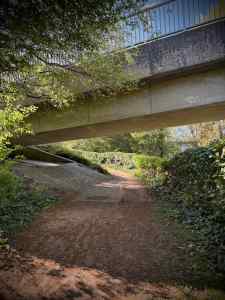 Rough path under bridge crossing V6 Grafton Street