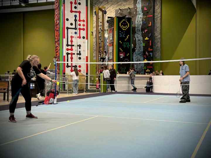 Playing Badminton in The Sports Hall
