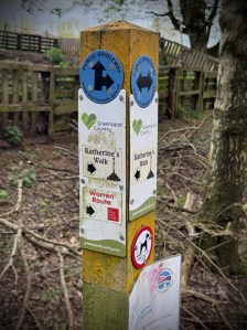 Public bridleway post with route directions