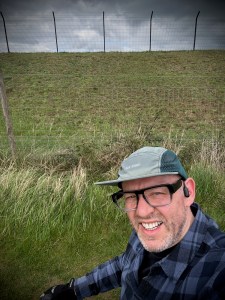 Selfie next to small reservoir