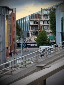Looking across Oxford Road to the demolition of All Saints Library