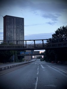 Horseshoe Bridge in front of a tower